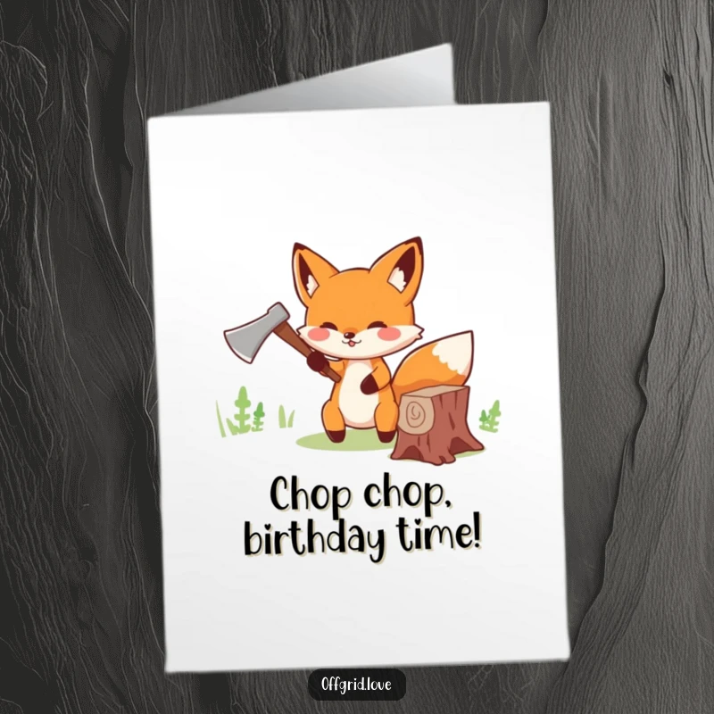 Funny Free Printable Birthday Card: Cute fox cheerfully chopping wood with a tiny axe, ready for celebration.